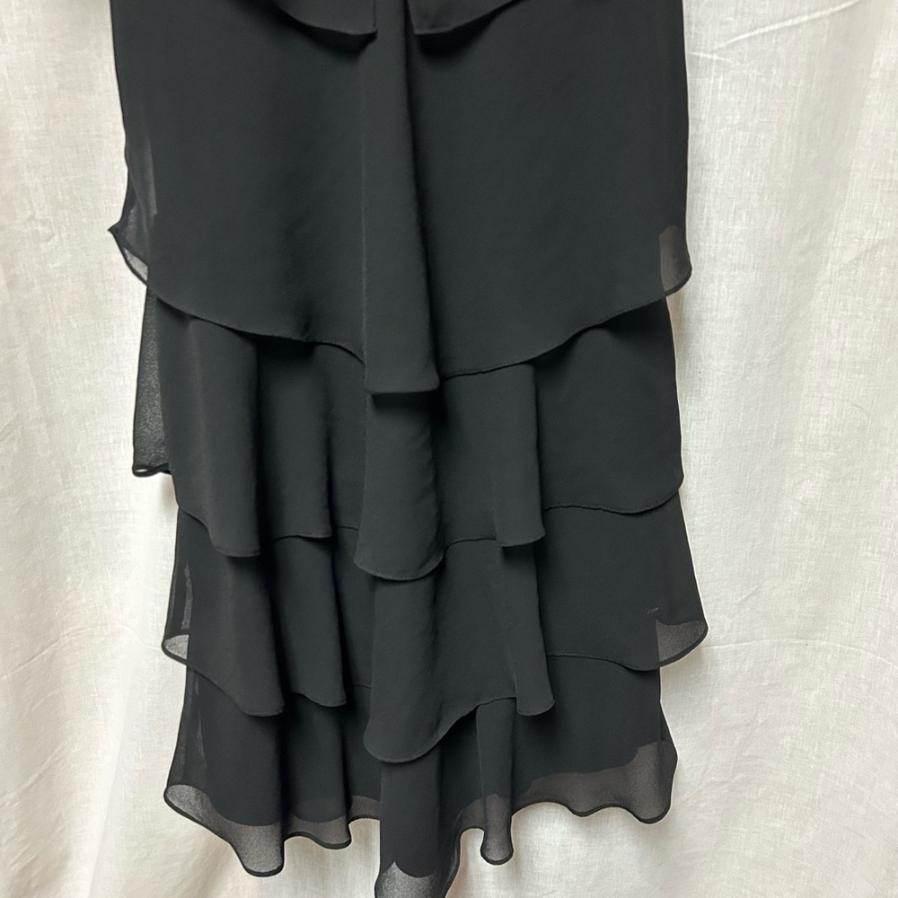 Black tiered sassy dress 
Cruise 
Hem 40” 23” armpit to armpit flat 
Size 18 - Picture 7 of 13